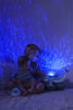 Cloud b® Tranquil Whale™ Blue Family - Lampka z projekcją świetlną i grzechotką -Wieloryb niebieski